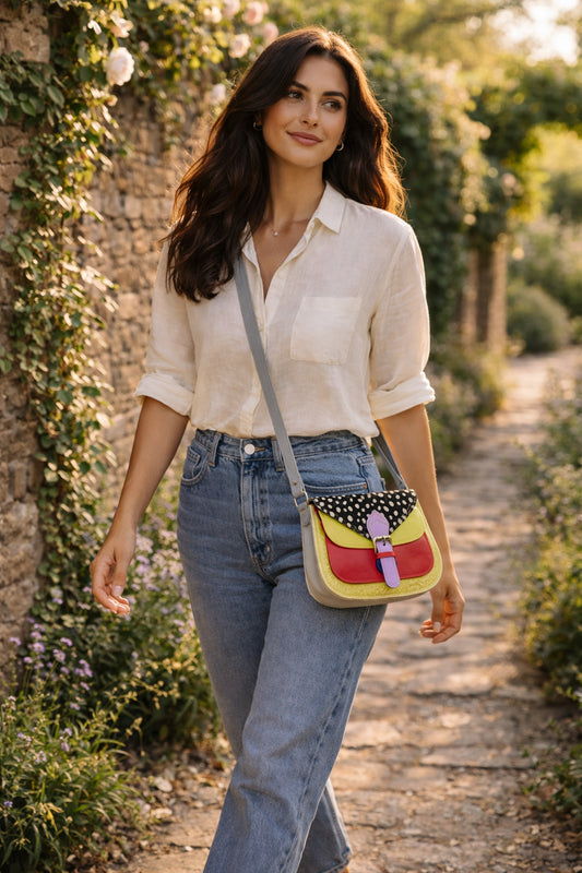 Handmade Leather Crossbody Bag - Romy featuring a multicolor design with polka dots and a stylish buckle.