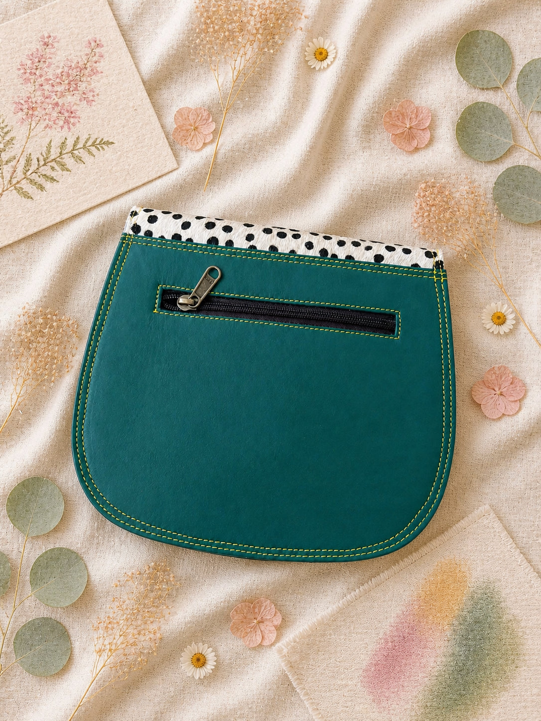 Handmade Leather Crossbody Bag - Romy - Painted Garden - Celeste on a soft background with dried flowers.