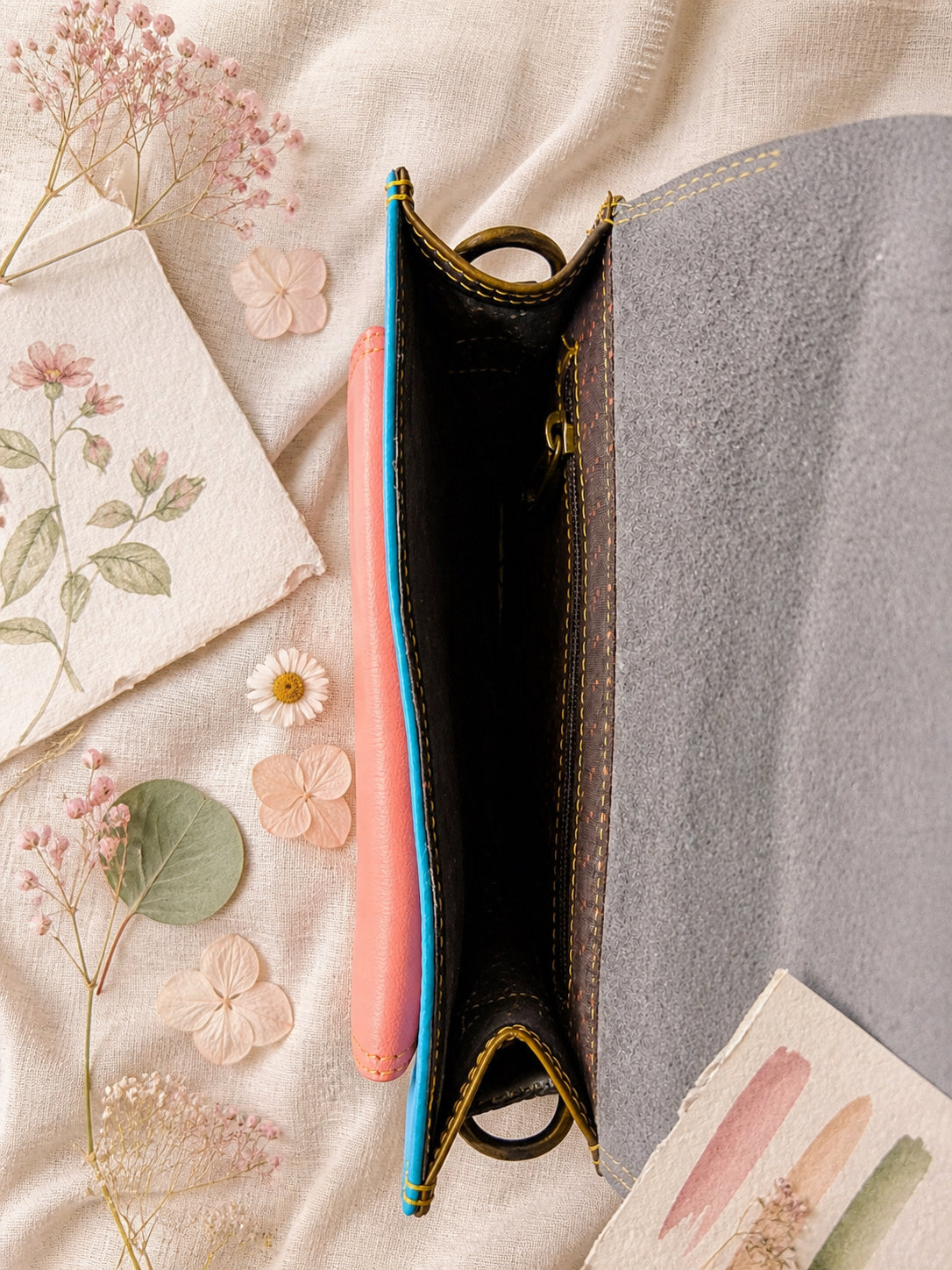 Handmade Leather Crossbody Bag - Romy - Painted Garden - Celeste on a soft background with dried flowers.