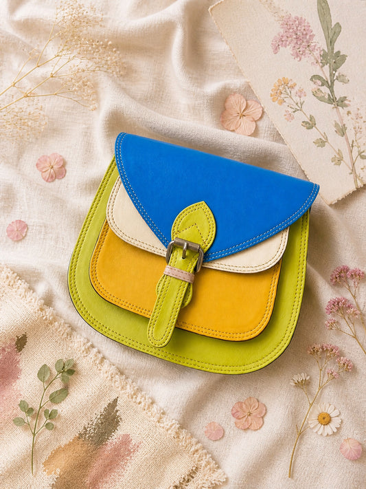 Handmade Leather Crossbody Bag - Romy - Painted Garden - Citrine on a soft background with dried flowers.
