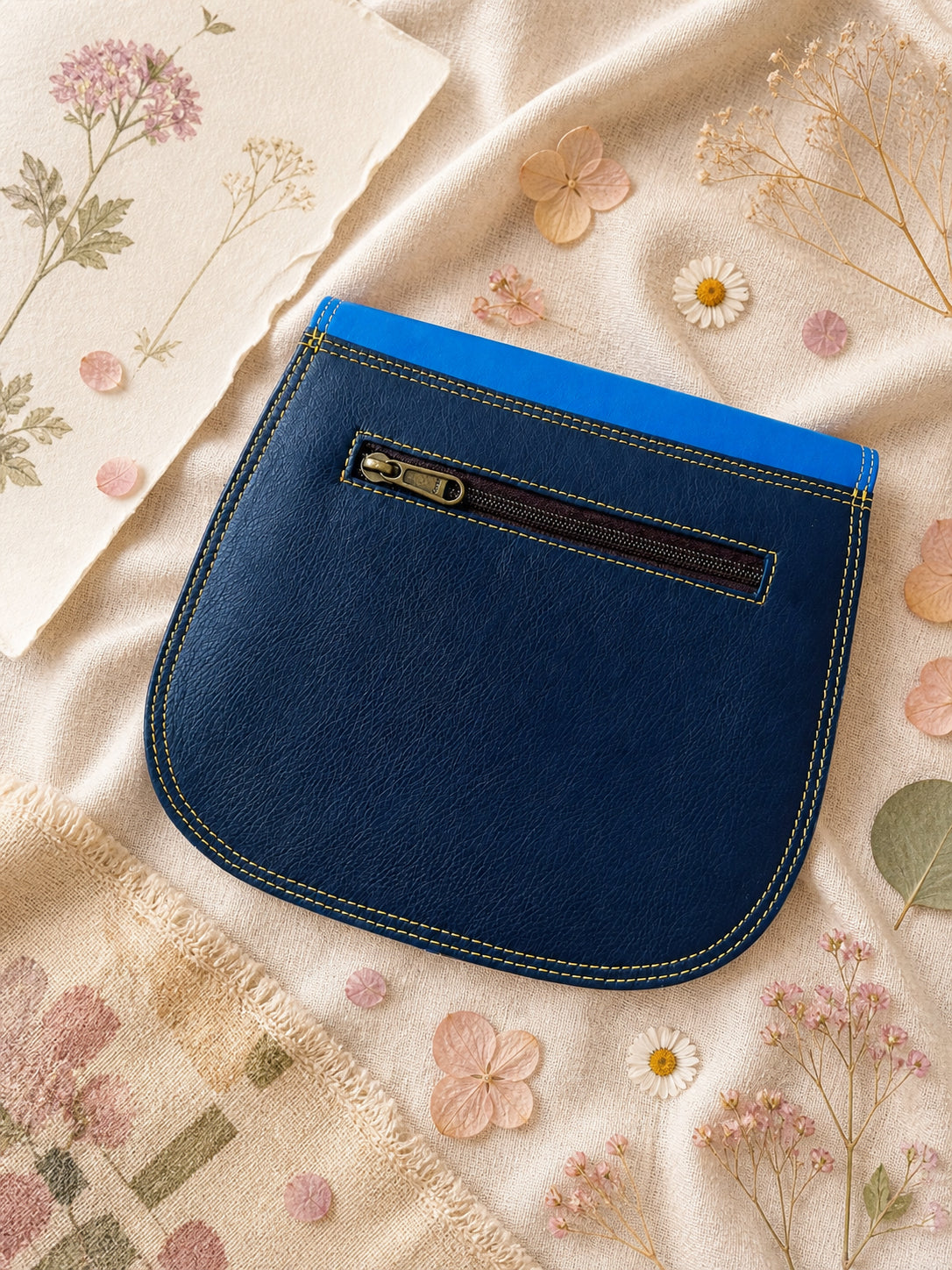 Handmade Leather Crossbody Bag - Romy - Painted Garden - Citrine on a soft background with dried flowers.
