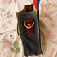 Handmade Leather Crossbody Bag - Romy - Painted Garden - Citrine on a soft background with dried flowers.