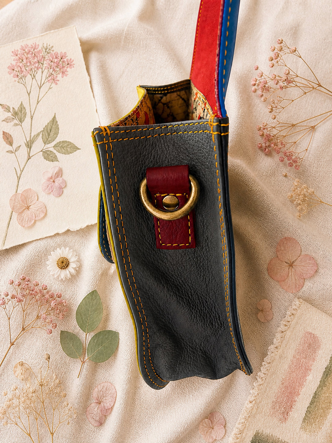 Handmade Leather Crossbody Bag - Romy - Painted Garden - Citrine on a soft background with dried flowers.