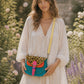 Handmade Leather Crossbody Bag featuring vibrant colors and leopard print flap design, perfect for stylish everyday use.