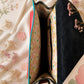 Handmade Leather Crossbody Bag featuring vibrant colors and leopard print flap design, perfect for stylish everyday use.