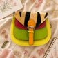 Handmade Leather Crossbody Bag - Romy - Painted Garden - Marigold on a textured background with floral elements.