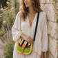 Handmade Leather Crossbody Bag - Romy - Painted Garden - Marigold on a textured background with floral elements.