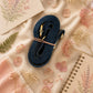 Handmade Leather Crossbody Bag - Romy - Painted Garden - Marigold on a textured background with floral elements.
