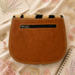 Handmade Leather Crossbody Bag - Romy - Painted Garden - Marigold on a textured background with floral elements.