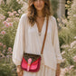 Handmade Leather Crossbody Bag featuring a vibrant pink and leopard print design, perfect for stylish everyday use.