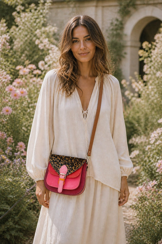 Handmade Leather Crossbody Bag featuring a vibrant pink and leopard print design, perfect for stylish everyday use.
