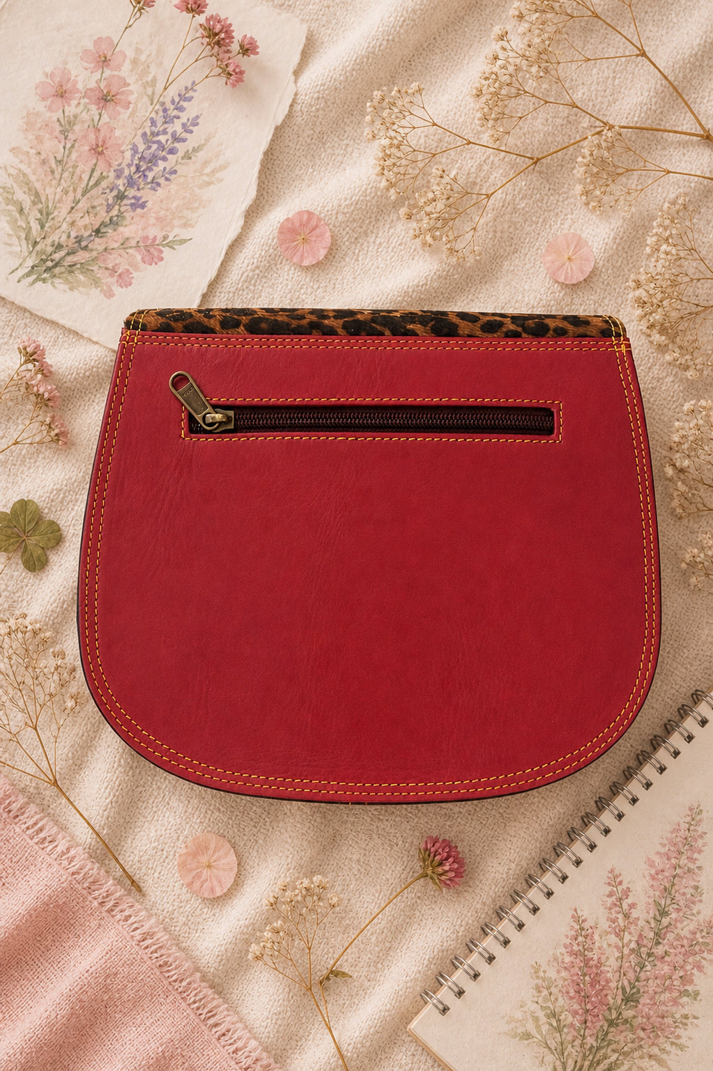 Handmade Leather Crossbody Bag featuring a vibrant pink and leopard print design, perfect for stylish everyday use.