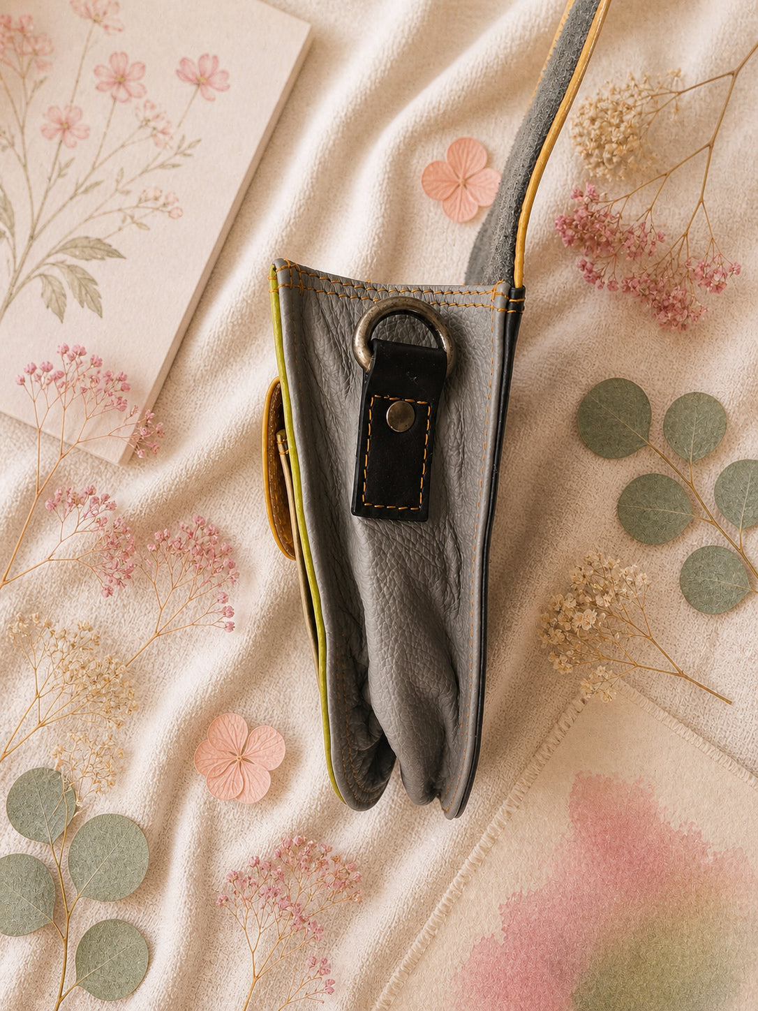 Handmade Leather Crossbody Bag - Romy - Painted Garden - Primrose in vibrant yellow and green leather with floral background.