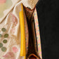 Handmade Leather Crossbody Bag - Romy with colorful zebra print and vibrant colors on a floral background.