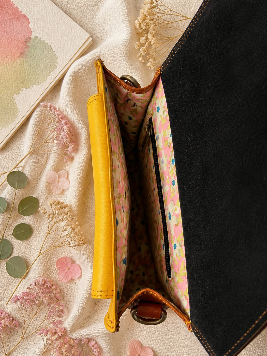 Handmade Leather Crossbody Bag - Romy with colorful zebra print and vibrant colors on a floral background.