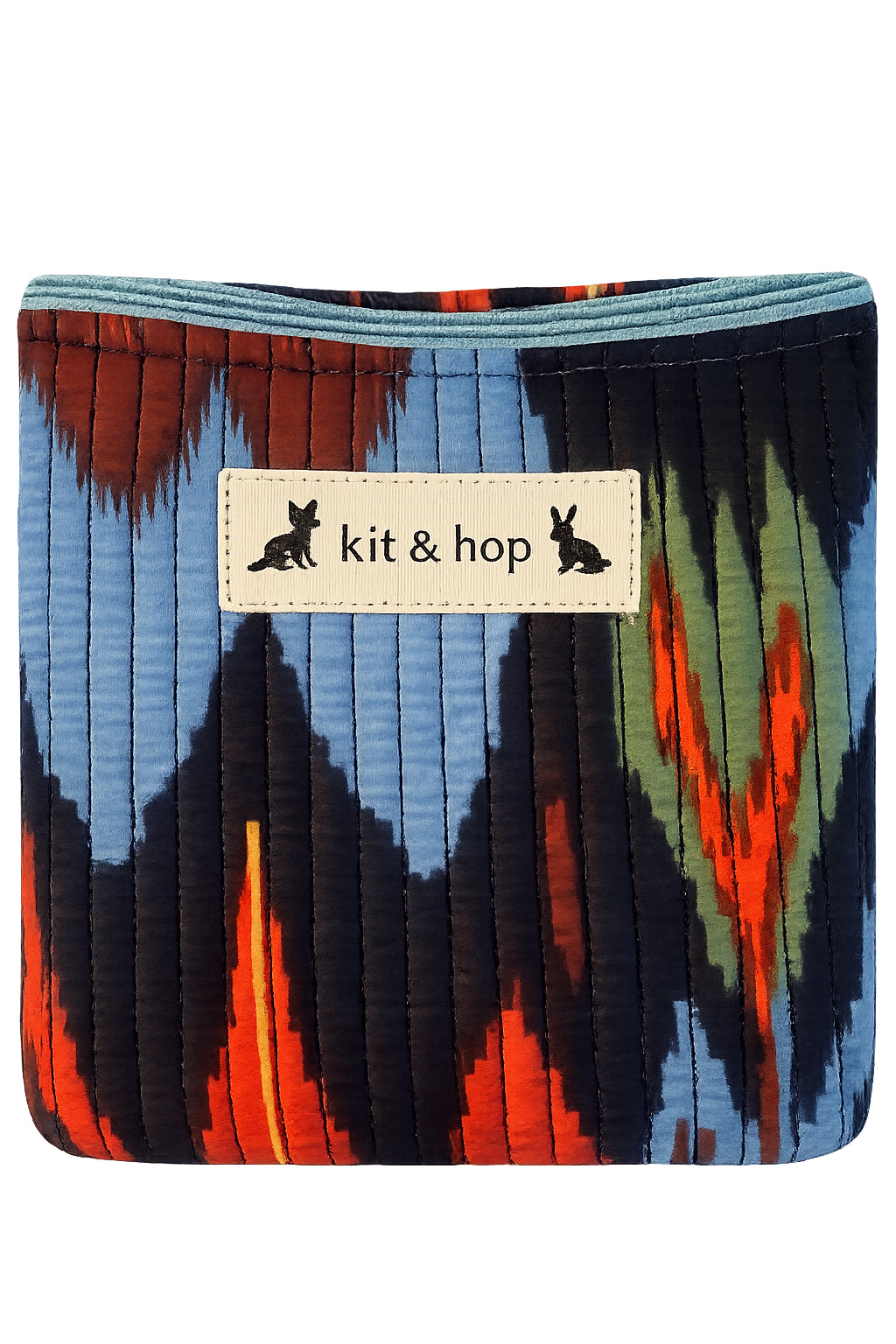 Handmade cross body bag in vibrant colors worn by a woman in a field, showcasing style and comfort.