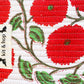 Handmade cross body bag Elara in Poppy pattern, worn by a woman in a field, perfect for everyday use.