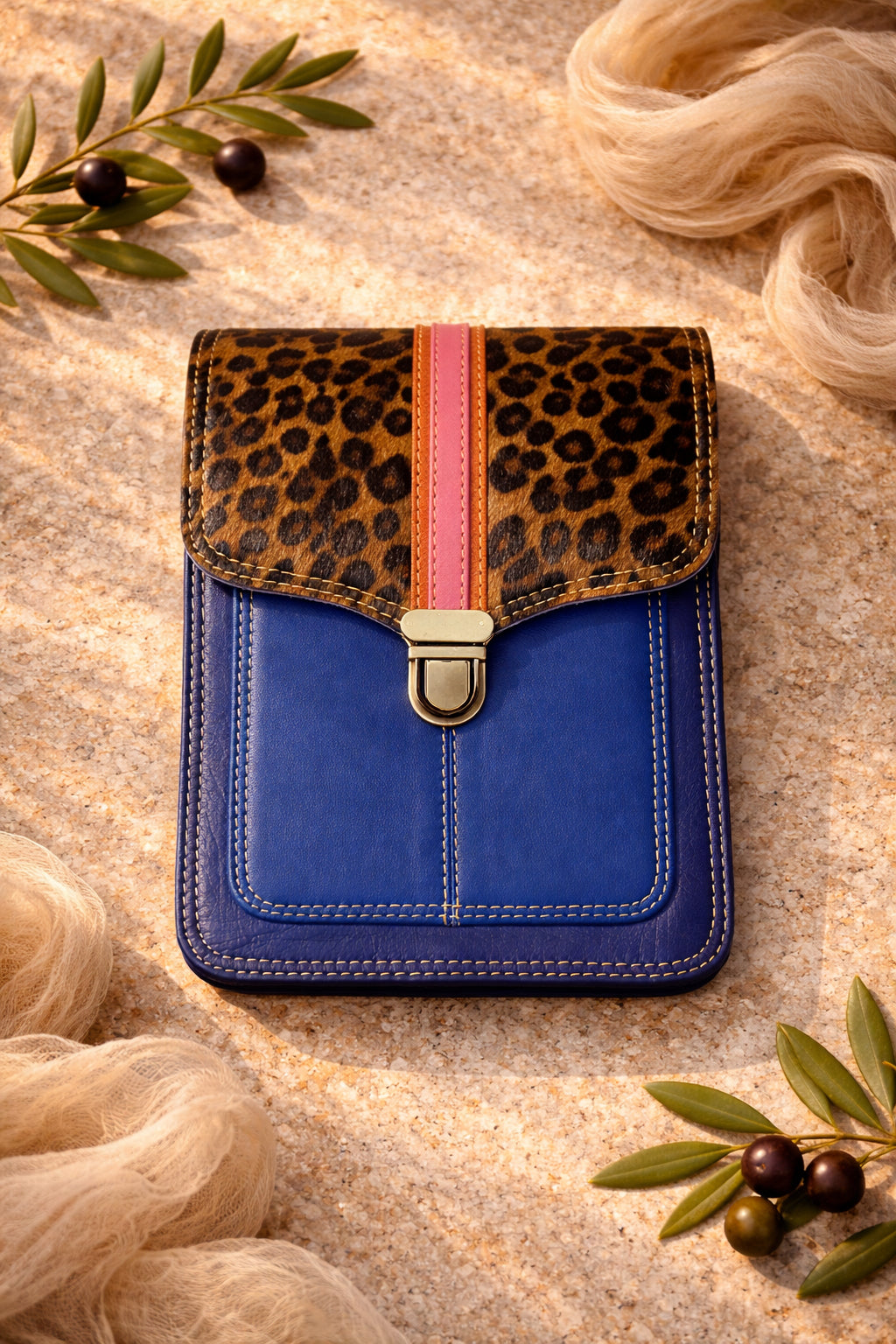 Handmade Leather Crossbody Bag - Alba in Capri Blue with leopard print flap and pink stripe.