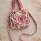 Handmade Cotton Mini Tote Bag - Lila - Wild Meadow - Arlo displayed on a wall with floral decor.