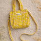 Handmade Cotton Mini Tote Bag - Lila in a yellow checked pattern, featuring adjustable straps and a soft, lightweight design.