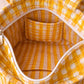 Handmade Cotton Mini Tote Bag - Lila in a yellow checked pattern, featuring adjustable straps and a soft, lightweight design.