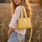 Handmade Cotton Mini Tote Bag - Lila in a yellow checked pattern, featuring adjustable straps and a soft, lightweight design.