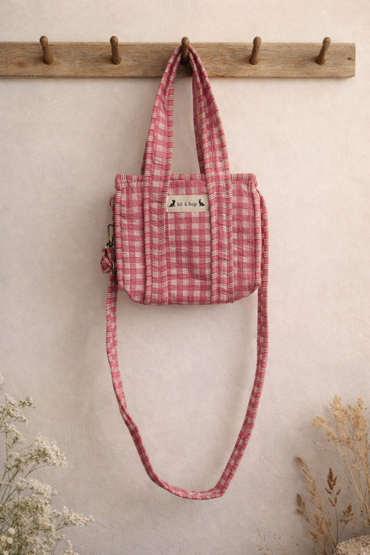 Handmade Cotton Mini Tote Bag in pink checkered pattern, hanging on a wooden hook, perfect for everyday use.