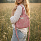 Handmade Cotton Mini Tote Bag in pink checkered pattern, hanging on a wooden hook, perfect for everyday use.