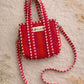 Handmade Cotton Mini Tote Bag - Lila - Wild Meadow - Peony displayed on a wall hook with floral background.