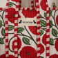 Handmade Cotton Mini Tote Bag - Lila - Wild Meadow - Poppy hanging on a wooden hook, showcasing its floral design.