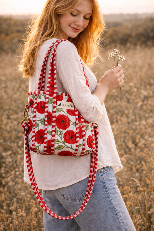 Handmade Cotton Mini Tote Bag - Lila - Wild Meadow - Poppy hanging on a wooden hook, showcasing its floral design.