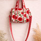 Handmade Cotton Mini Tote Bag - Lila - Wild Meadow - Poppy hanging on a wooden hook, showcasing its floral design.