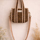 Handmade Cotton Mini Tote Bag - Lila - Wild Meadow -Sable with a stylish leopard print design, hung on a wooden hook.