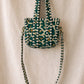 Handmade Cotton Mini Tote Bag - Lila - Wild Meadow - Olive hanging on a wooden hook with a stylish design.