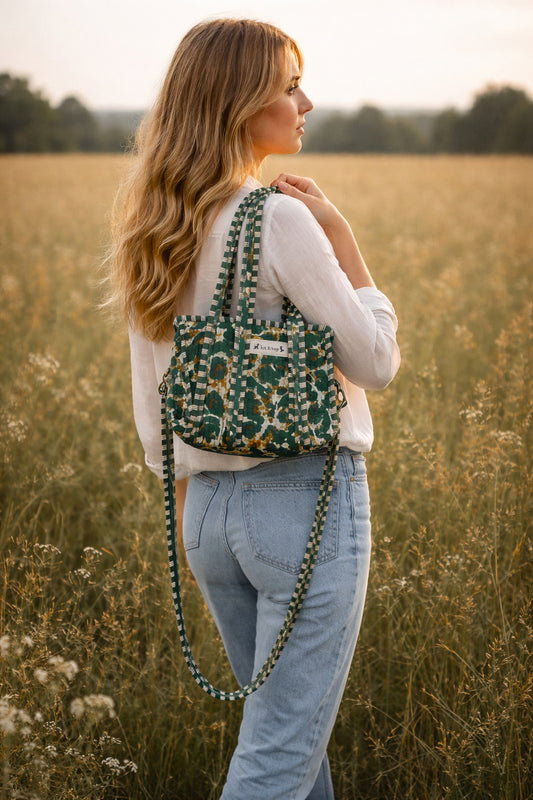 Handmade Cotton Mini Tote Bag - Lila - Wild Meadow - Olive hanging on a wooden hook with a stylish design.