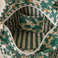 Handmade Cotton Mini Tote Bag - Lila - Wild Meadow - Olive hanging on a wooden hook with a stylish design.