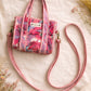 Handmade Cotton Mini Tote Bag - Lila - Wild Meadow - Paloma hanging against a wall with floral decorations.