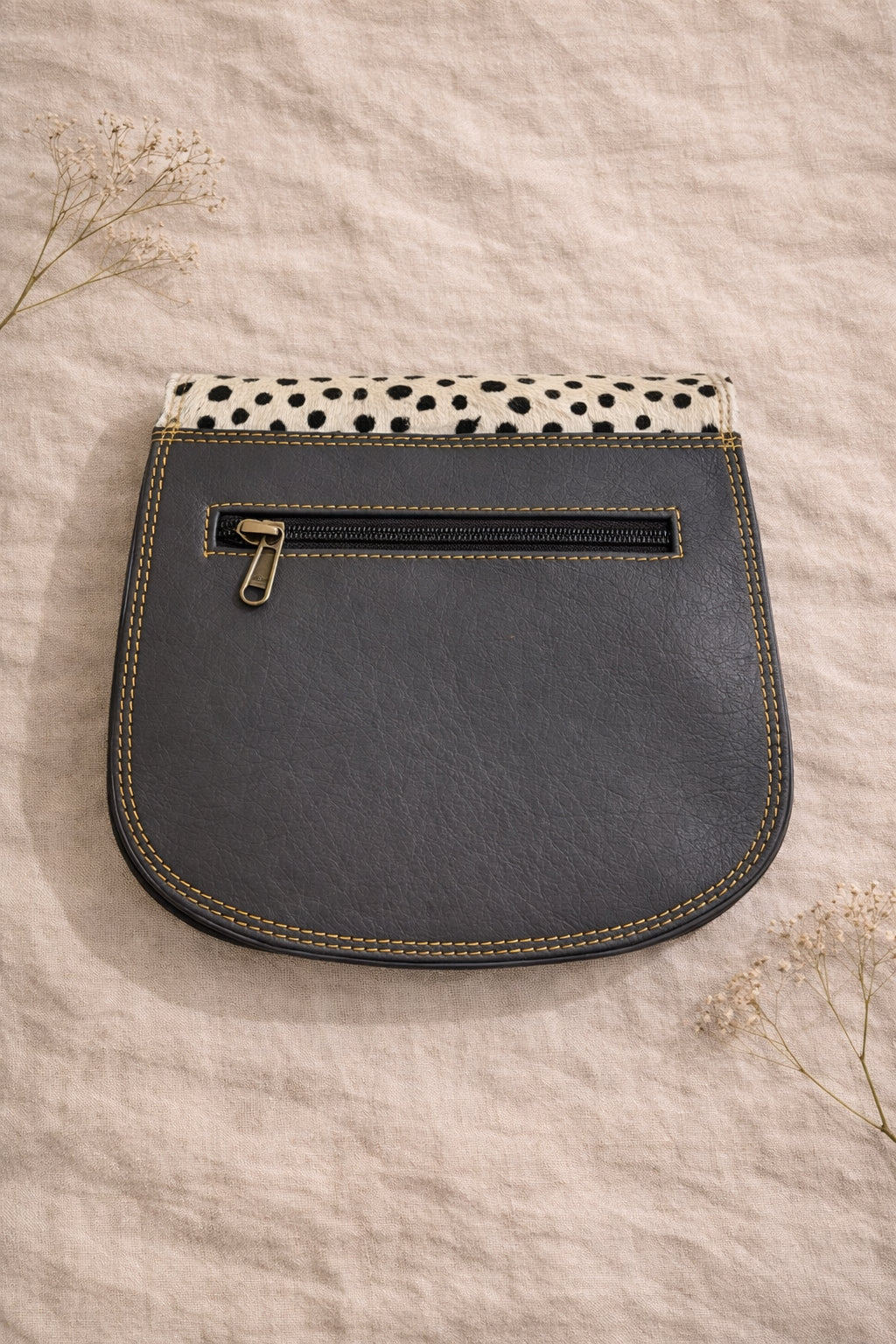 Handmade Leather Crossbody Bag featuring vibrant colors and polka dot design, perfect for stylish everyday use.