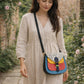 Handmade Leather Crossbody Bag featuring vibrant colors and polka dot design, perfect for stylish everyday use.