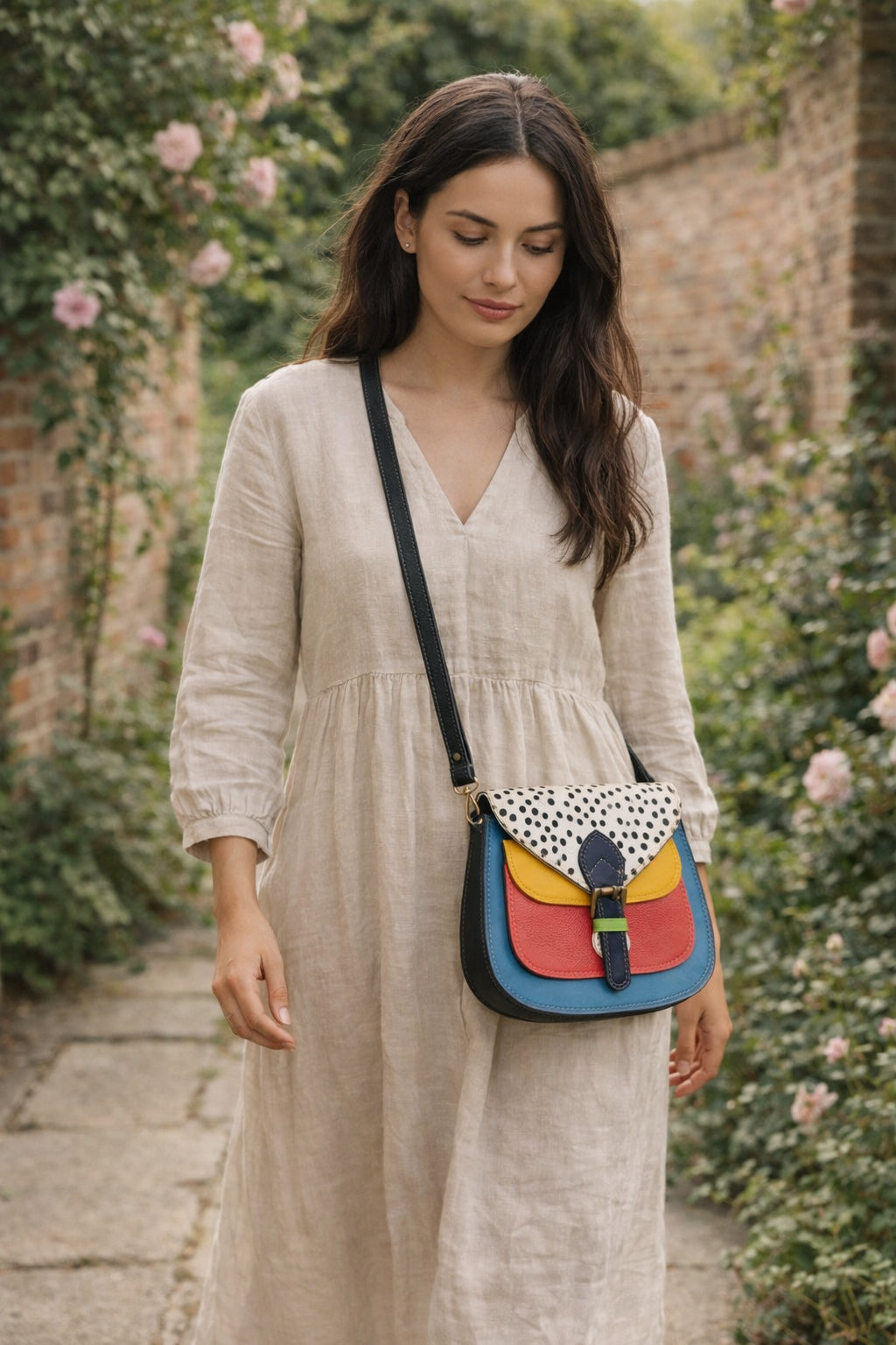 Handmade Leather Crossbody Bag featuring vibrant colors and polka dot design, perfect for stylish everyday use.