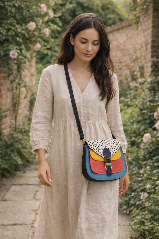Handmade Leather Crossbody Bag featuring vibrant colors and polka dot design, perfect for stylish everyday use.