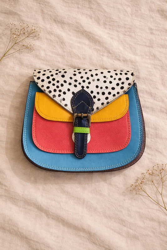 Handmade Leather Crossbody Bag featuring vibrant colors and polka dot design, perfect for stylish everyday use.