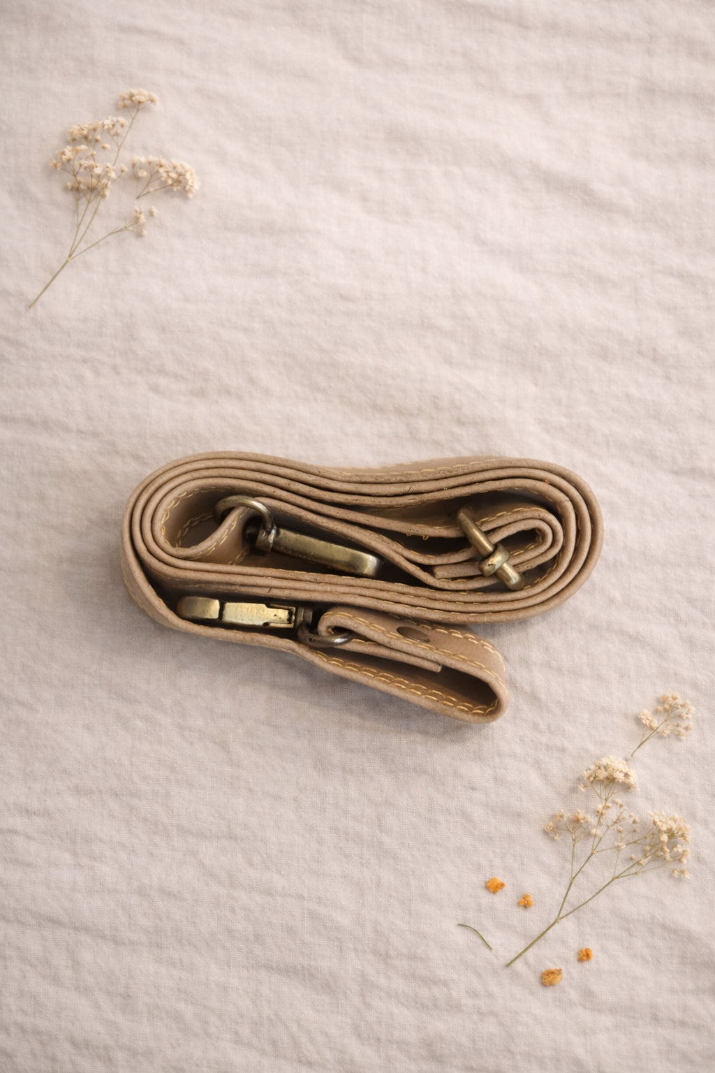 Handmade Leather Crossbody Bag in vibrant colors with unique patterns and a stylish buckle closure.