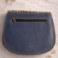 Handmade Leather Crossbody Bag in vibrant colors with unique patterns and a stylish buckle closure.