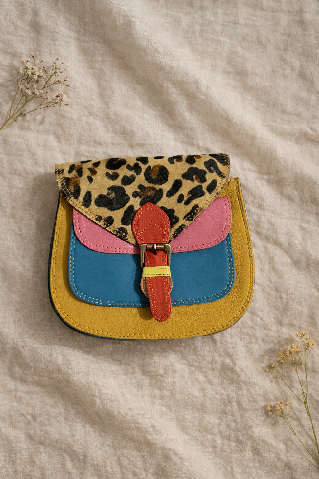 Handmade Leather Crossbody Bag - Romy - Walled Garden - Golden Leopard with colorful panels and leopard print flap.