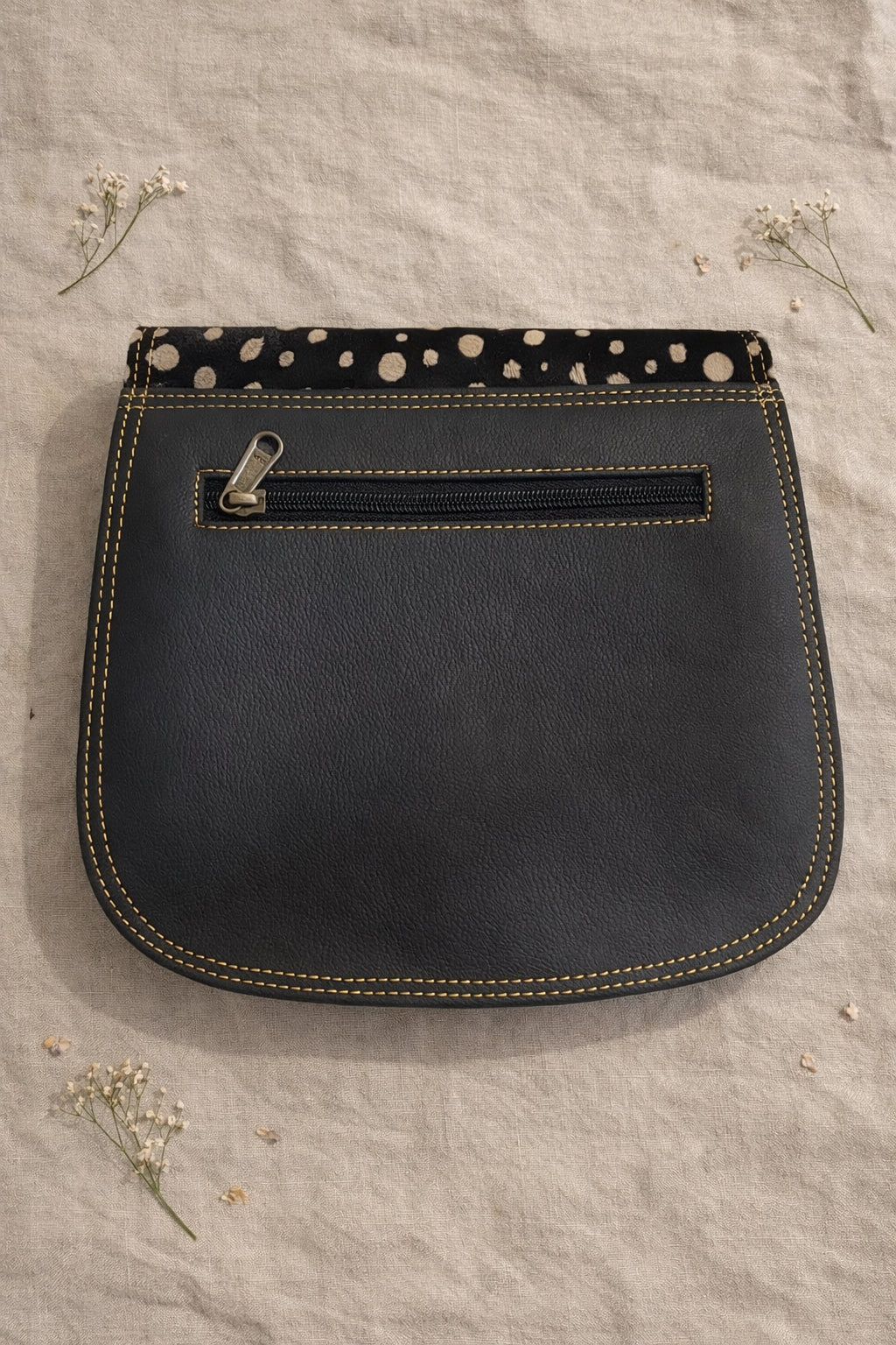 Handmade Leather Crossbody Bag - Romy featuring a multicolor design with polka dots and a stylish buckle.