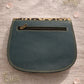 Handmade Leather Crossbody Bag featuring a leopard print flap with brown and green leather accents on a soft background.