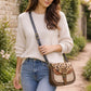 Handmade Leather Crossbody Bag featuring a leopard print flap with brown and green leather accents on a soft background.