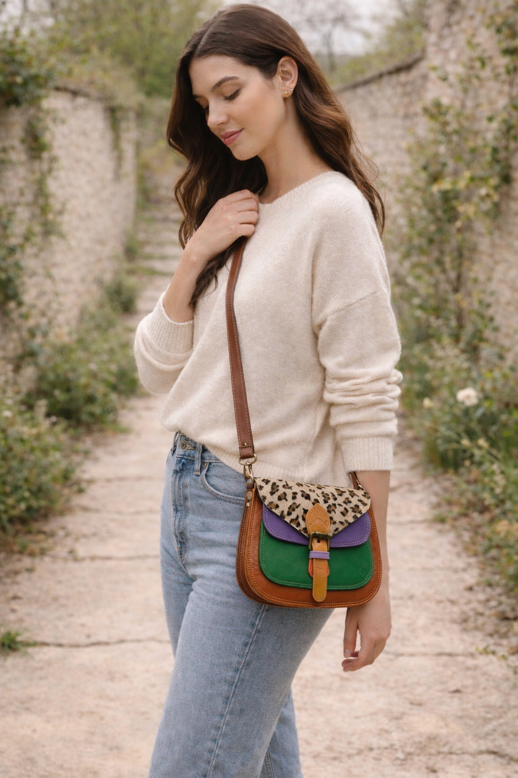 Handmade Leather Crossbody Bag in bright colors with a leopard print flap, displayed on a soft background.