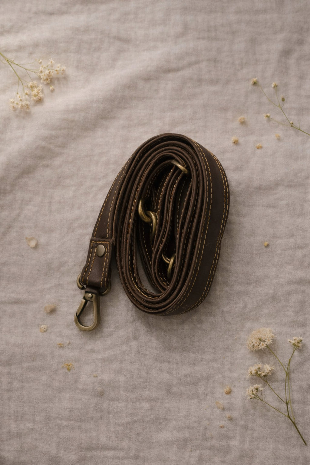 Handmade Leather Crossbody Bag featuring vibrant colors and a unique design with a spotted flap and buckle closure.
